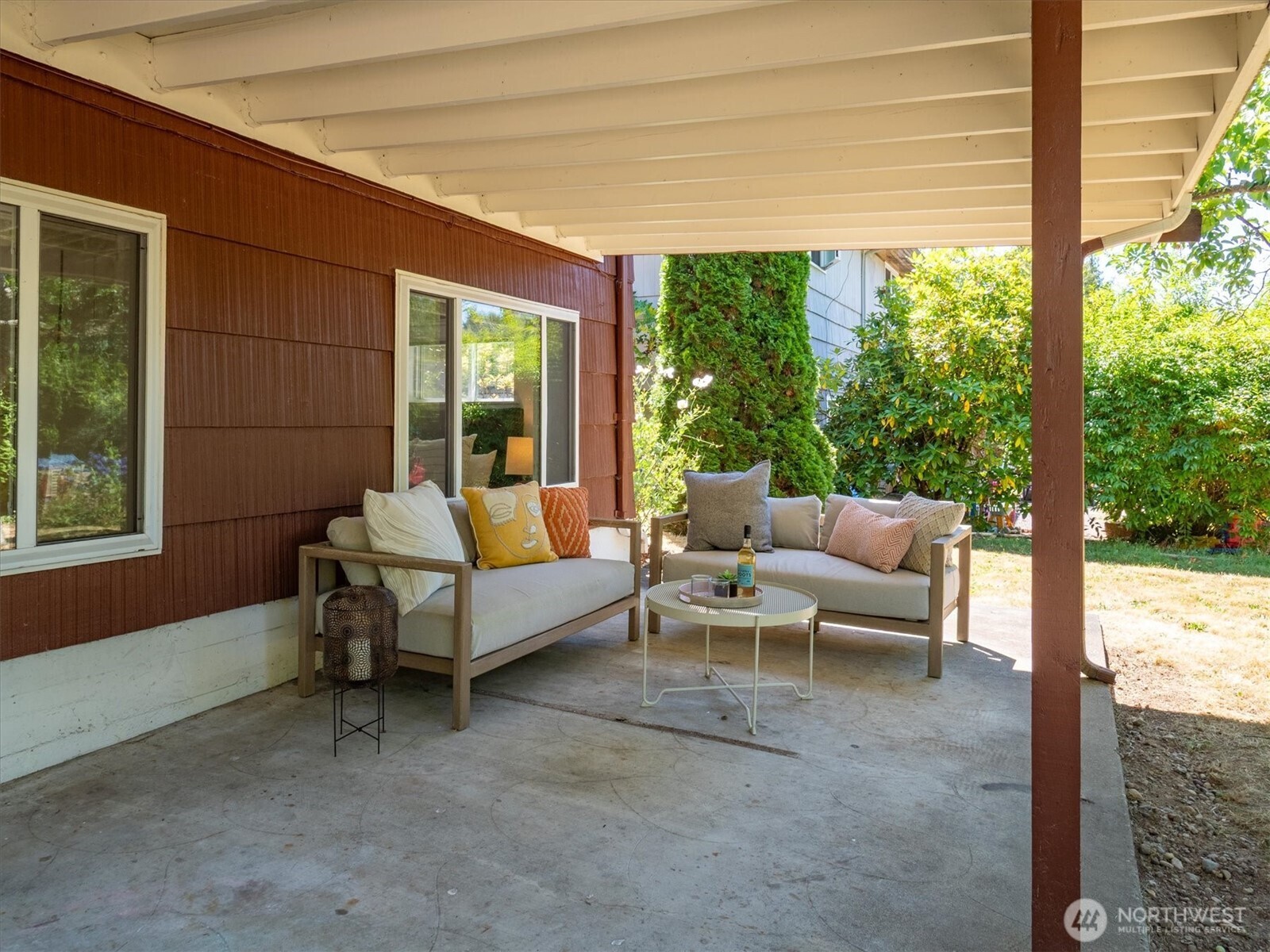 The fully covered patio is located just off the basement bonus room.