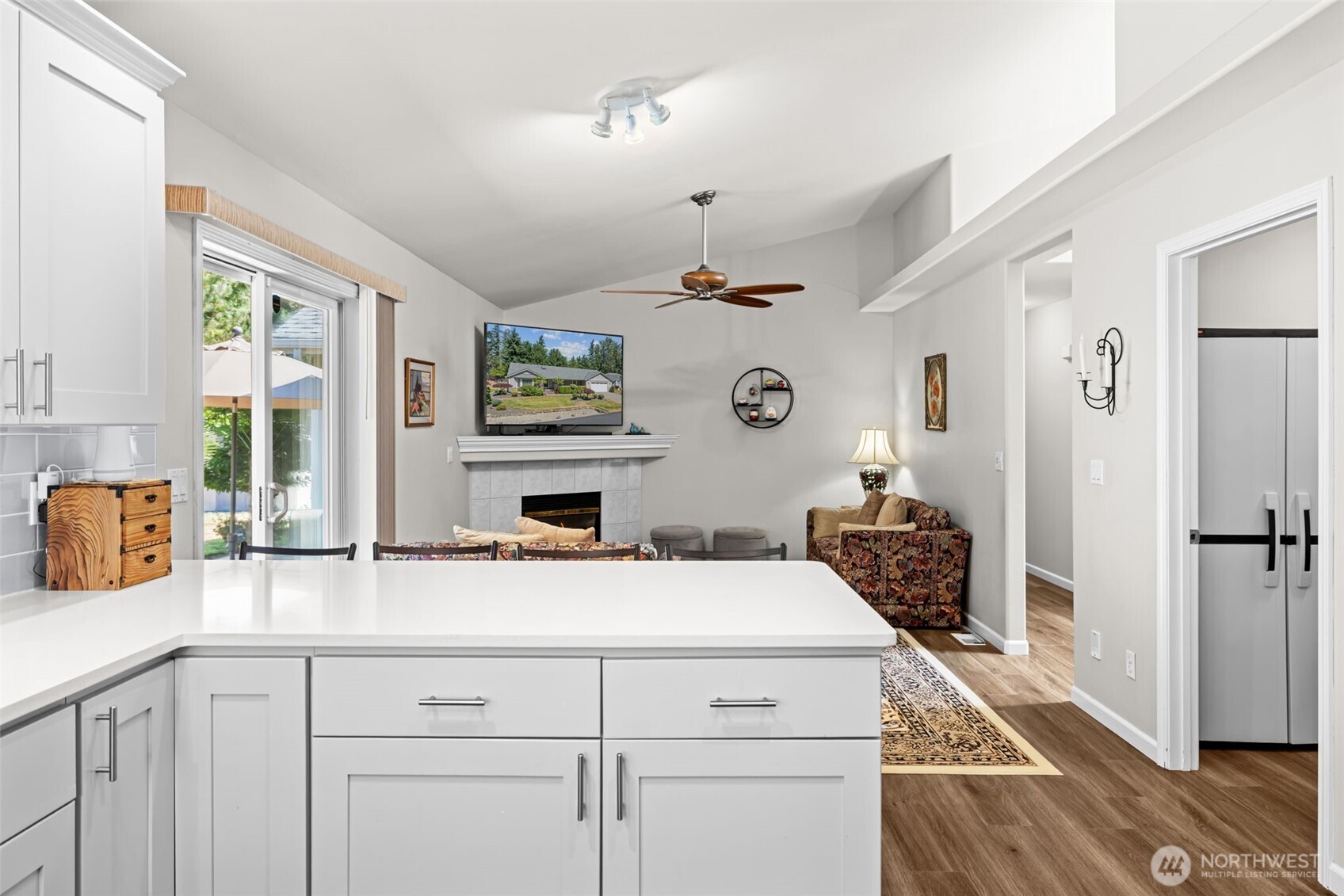 Soft closing cabinetry, ceiling fans, pantry closet in laundry room.