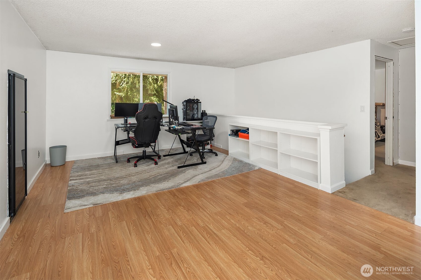 The upstairs has a gigantic loft. Big enough to create another living space, office of flex room.