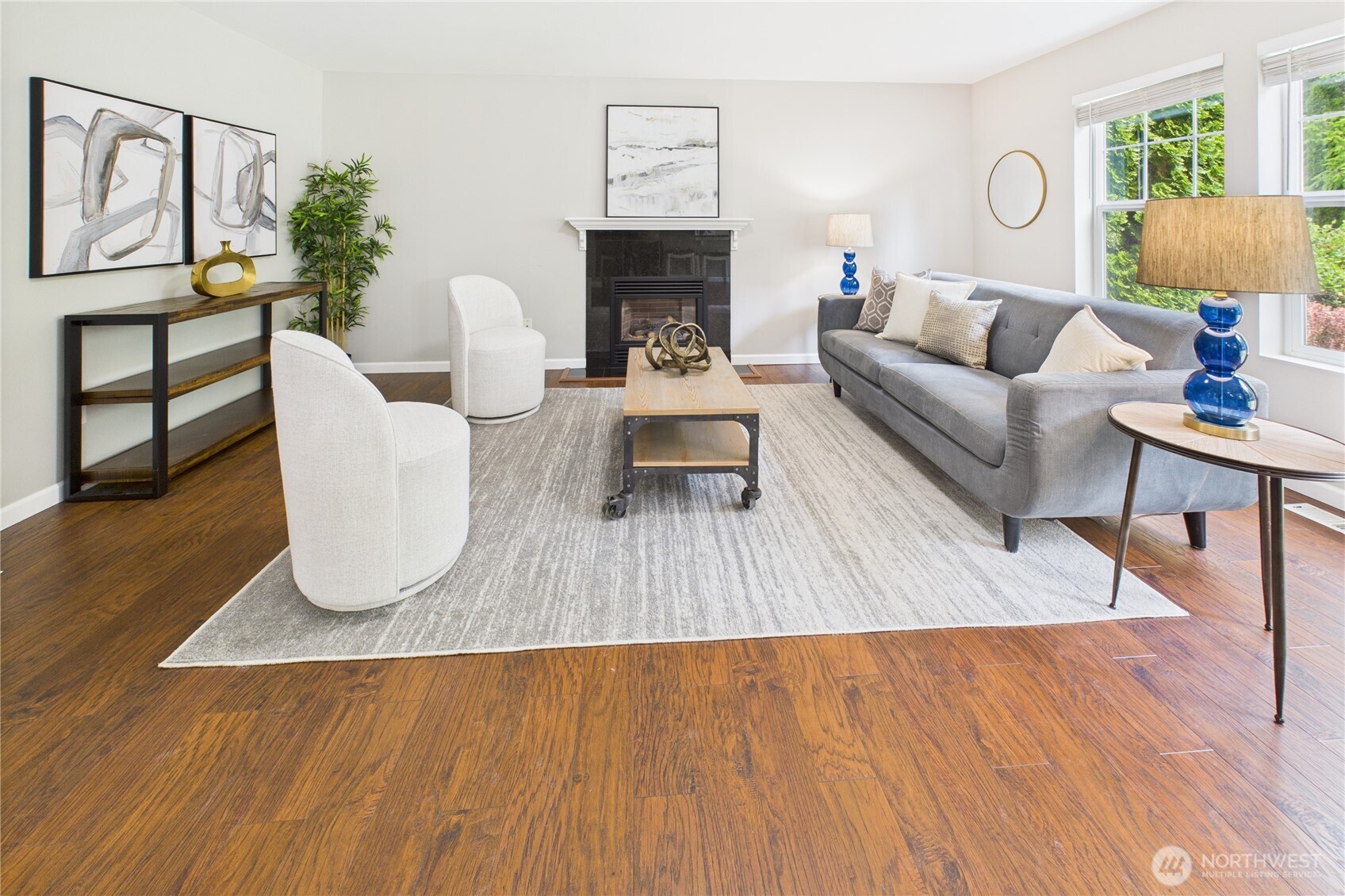 Anchored by a beautiful gas fireplace, this spacious family area is a true showstopper. With oversized windows, stylish finishes, and a great open layout, it’s ideal for both entertaining and cozy nights in.