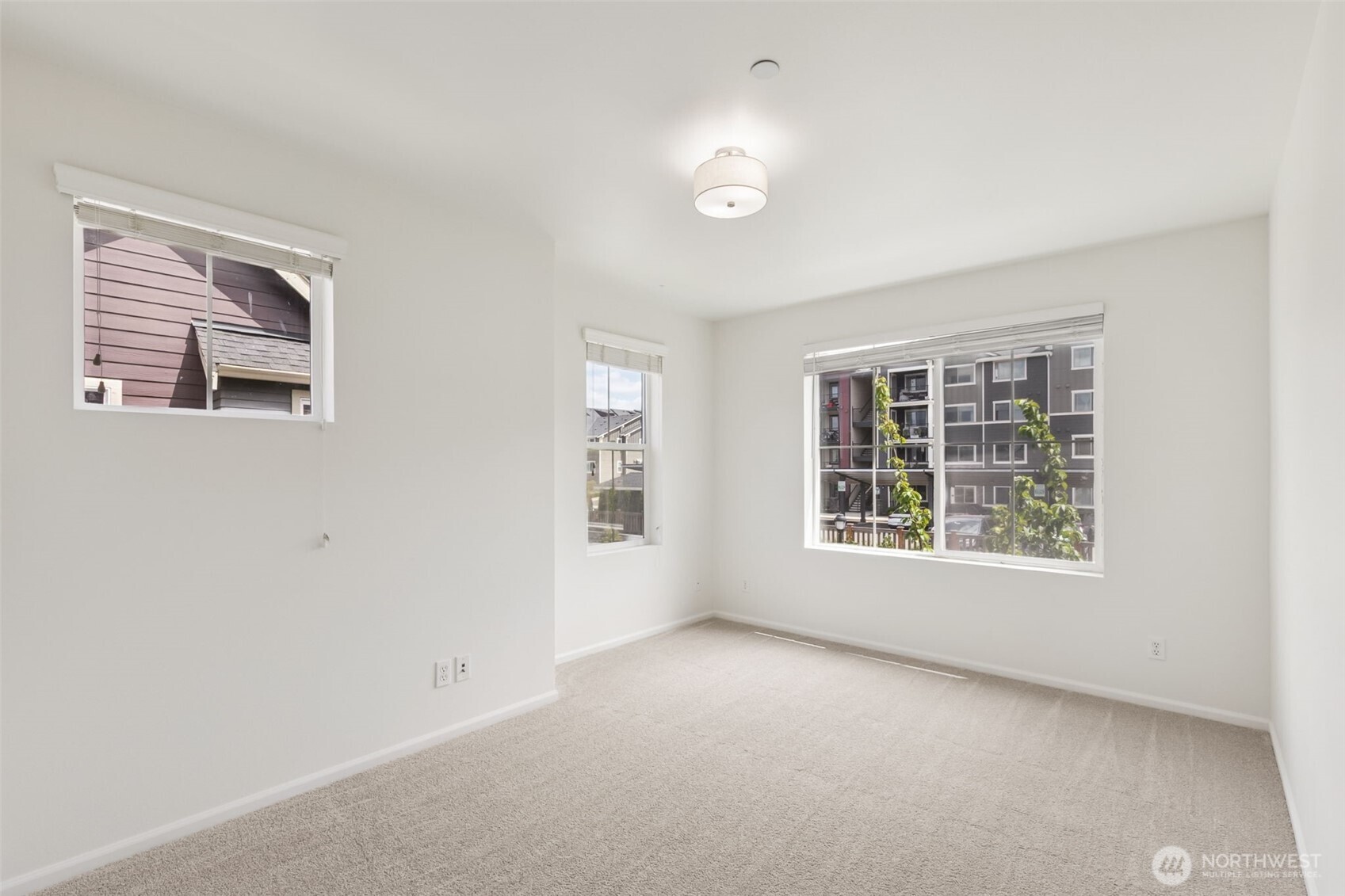 Additional view of the secondary bedroom highlights its bright, airy feel and flexible layout—perfect for personalized comfort and everyday use.