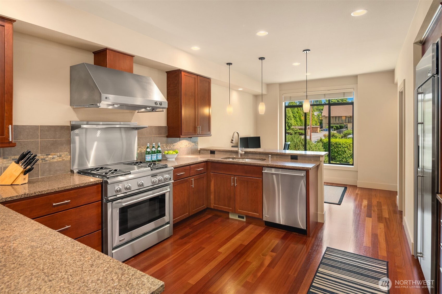Cherry hardwoods throughout the main living areas.
