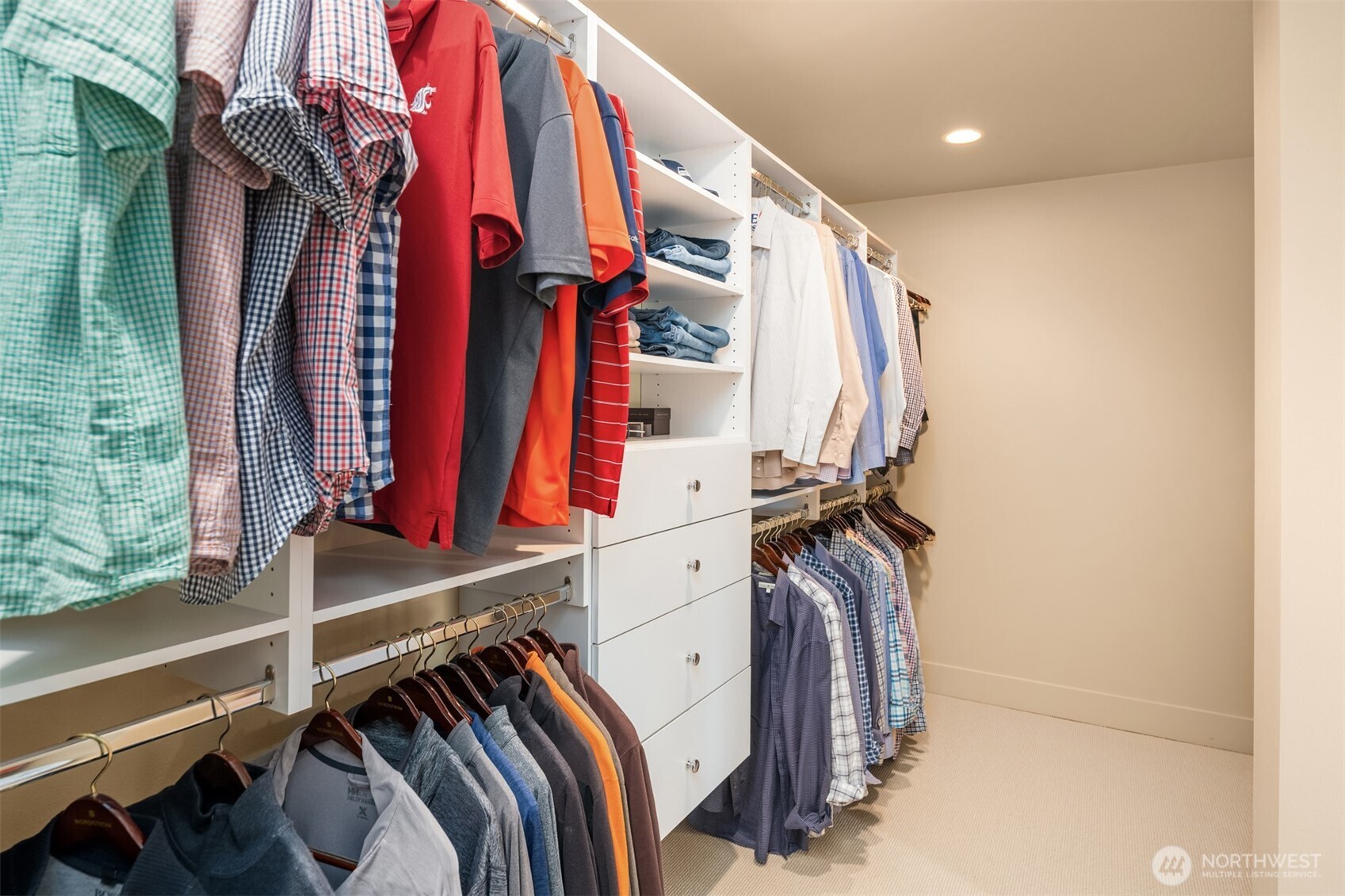 Fully built out closet on both sides.
