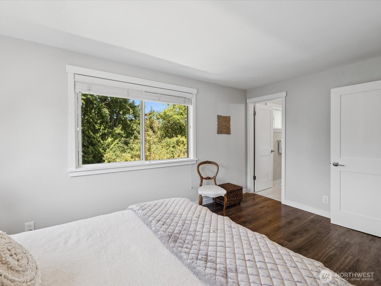 View out window overlooking the backyard, & entrance to the en-suite