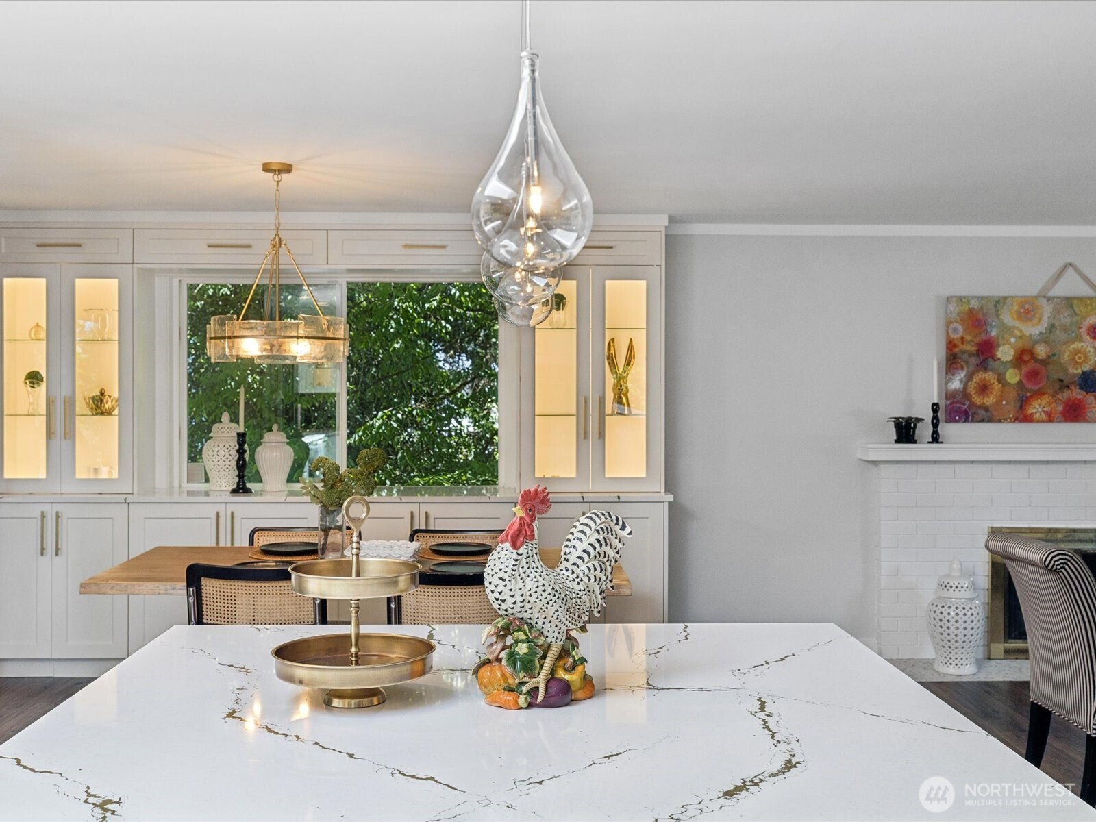 8'10" x 7'5" Cambria slab quartz kitchen & gorgeous pendant lights to enhance the natural light from the skylight