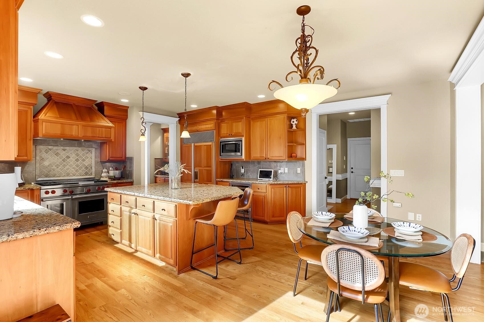 Sub-zero fridge, beverage/wine fridge and all appliances including Wolf 48" gas range.