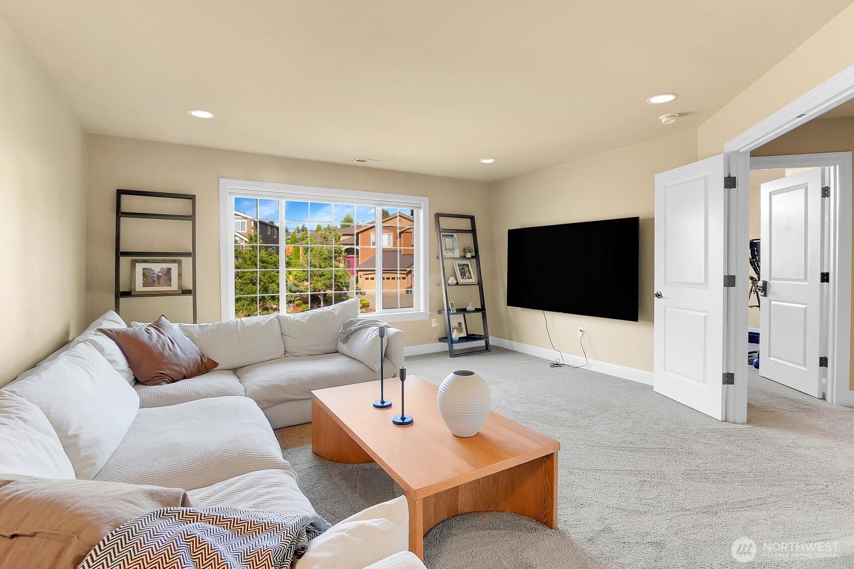 Upstairs double door family room.