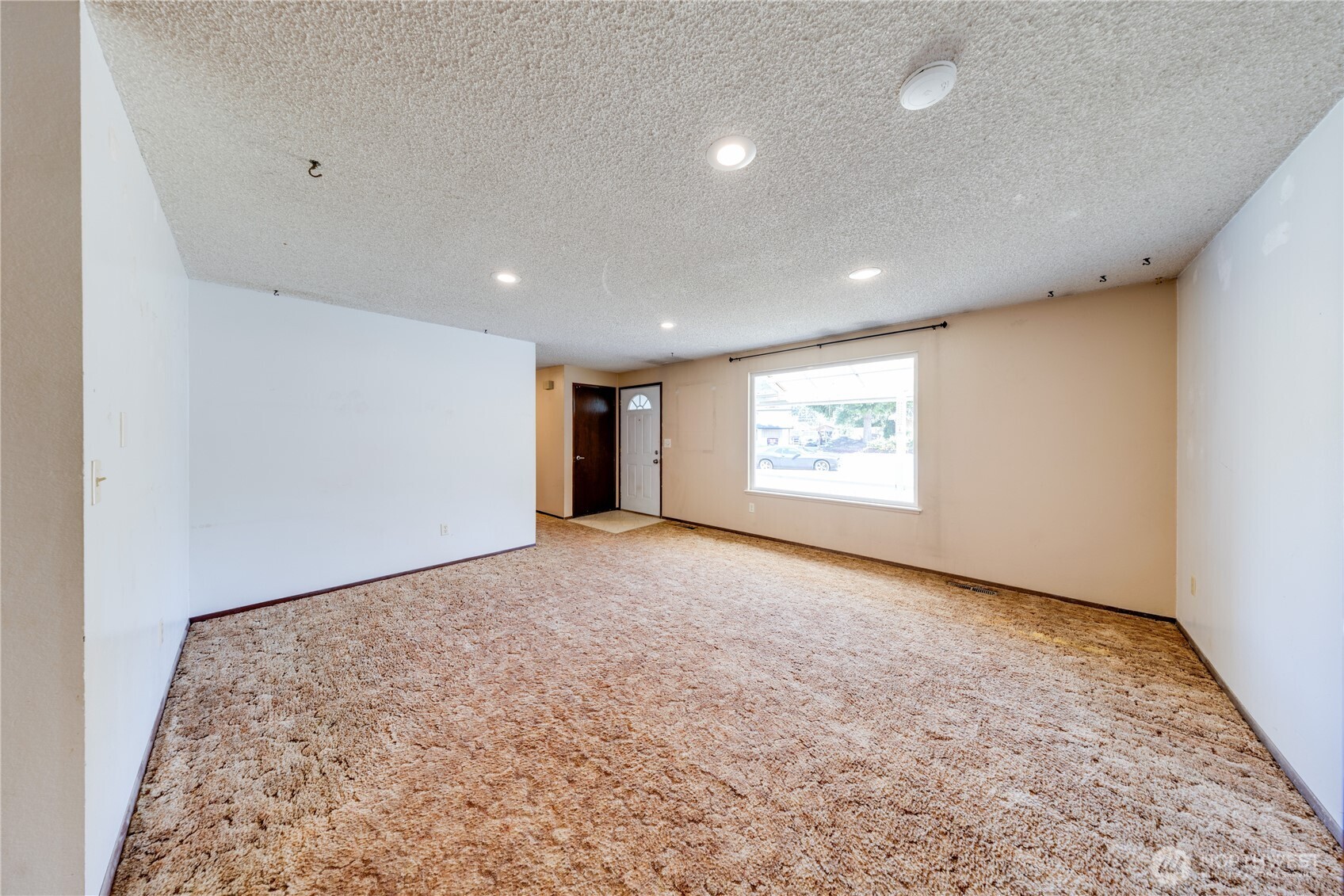 Living room is off the main entry