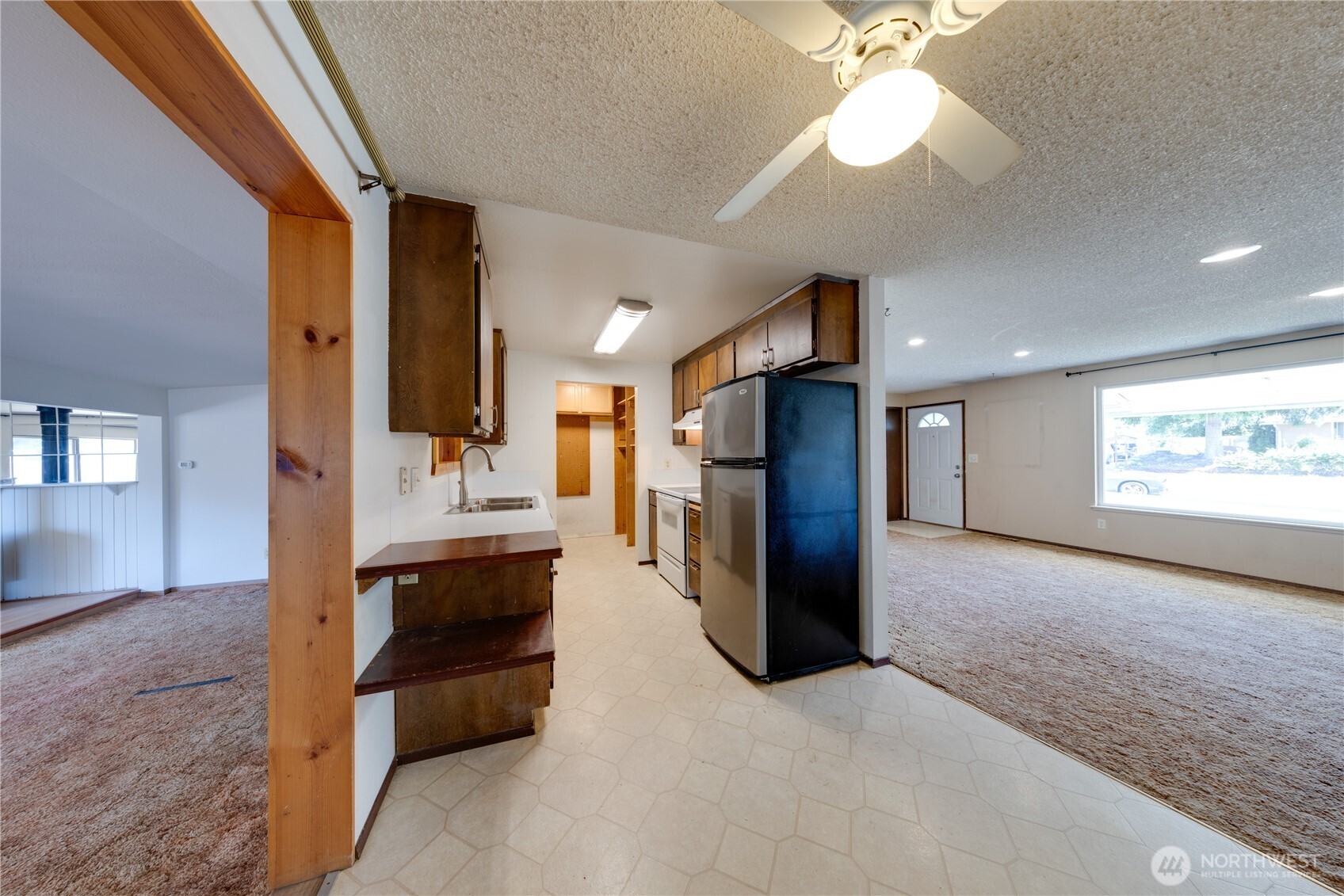 From the dining room, looking towards the liv rm, kitchen & fam. room
