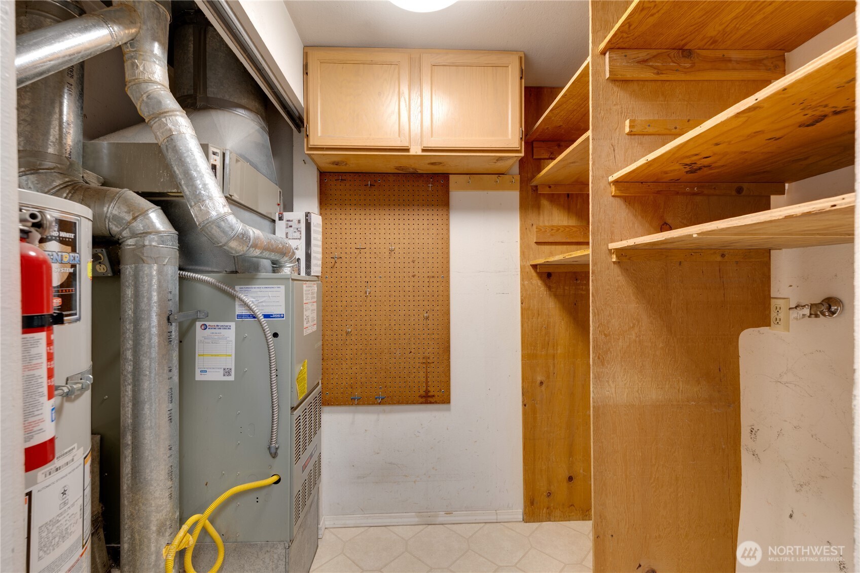 Laundry/utility room also has extra storage for your pantry items