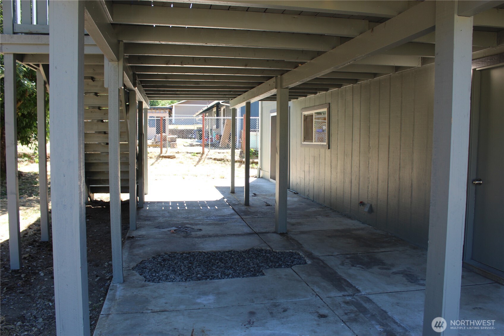 Huge covered deck off the upper level.