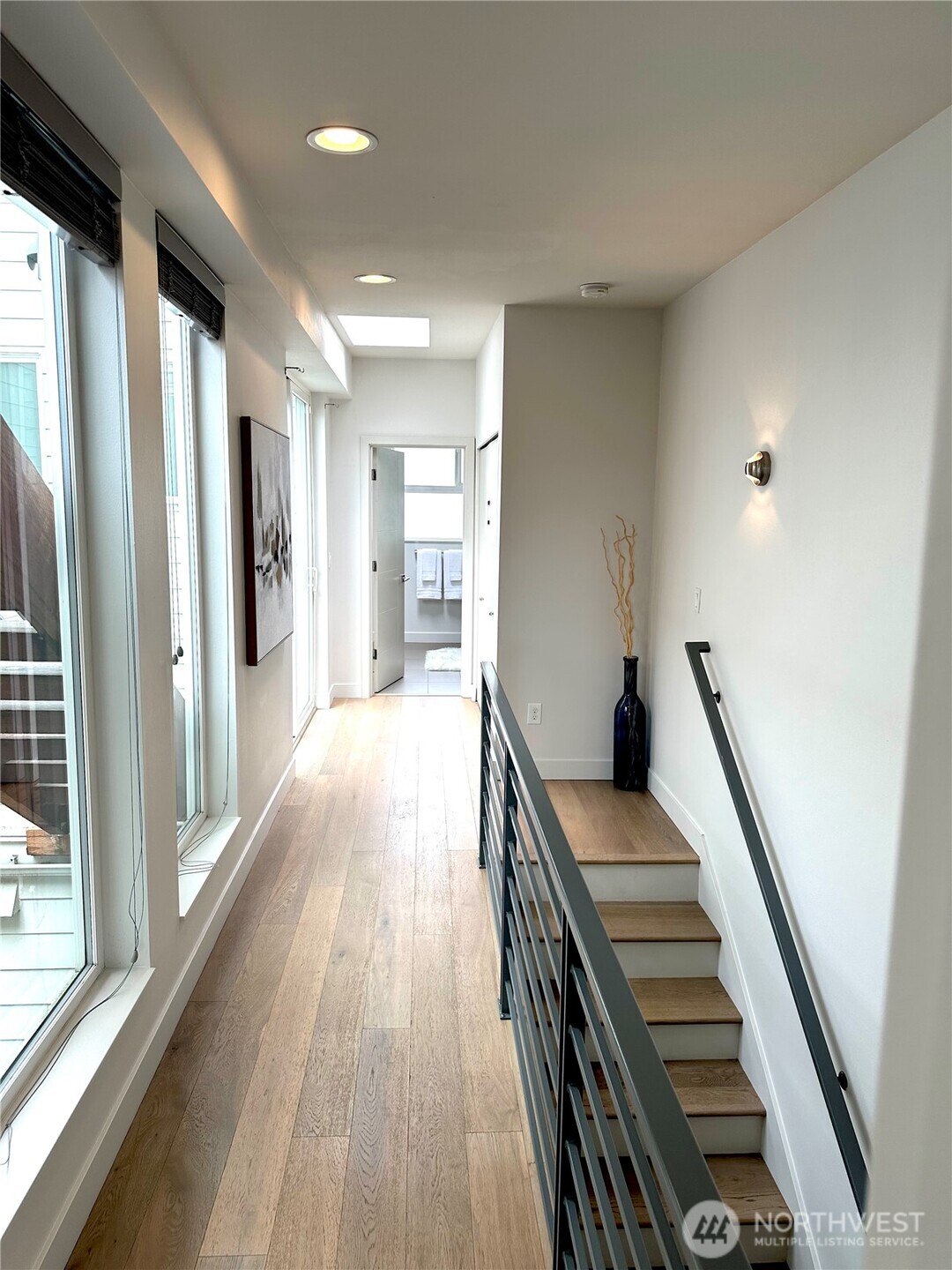 Large bright hallways w floor to ceiling windows