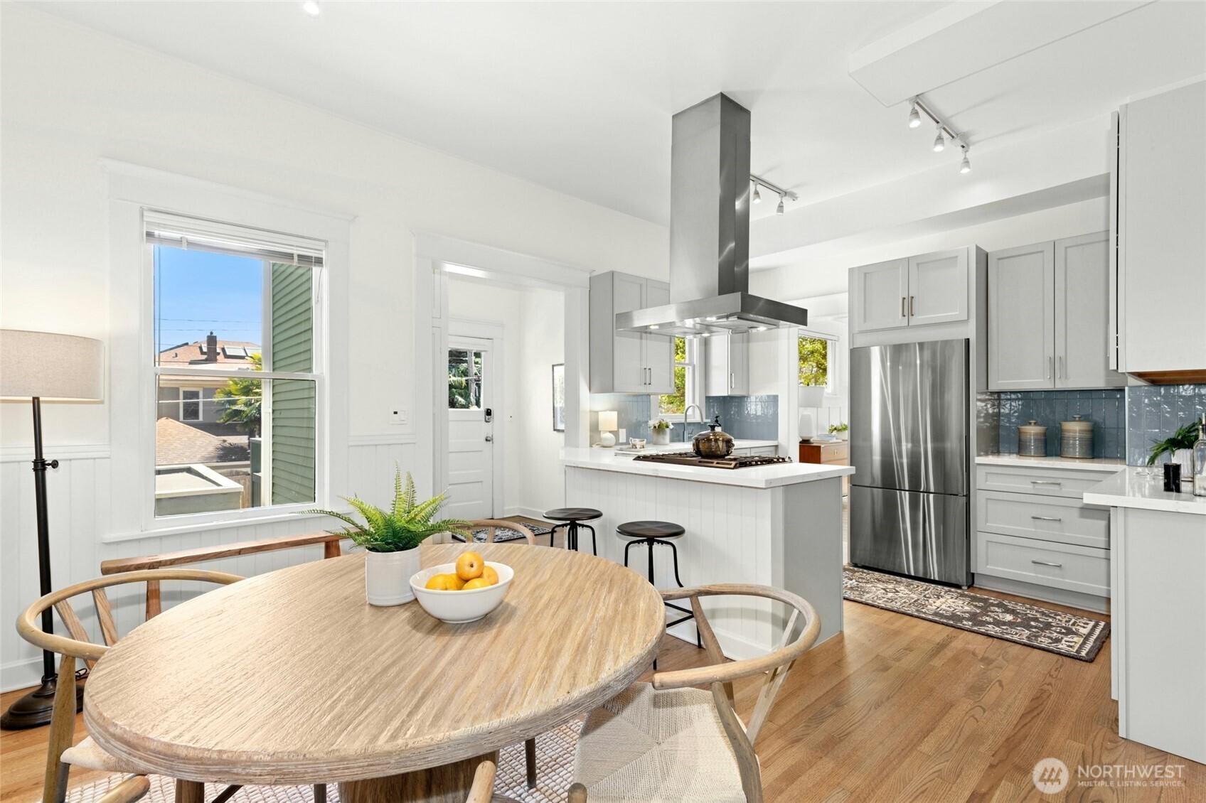 Lovely eat-in kitchen was recently updated. One could choose to have a breakfast table or create a cozy sitting area.