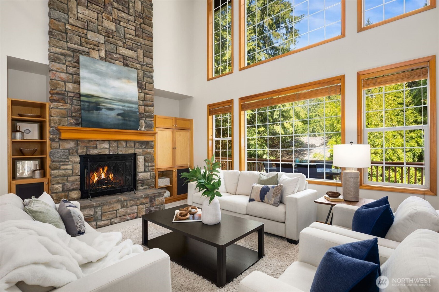 A striking stone fireplace, and a grand open great room is perfect for both intimate gatherings and large celebrations.