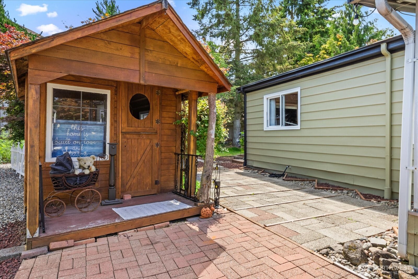 Covered carport plus bonus sheds