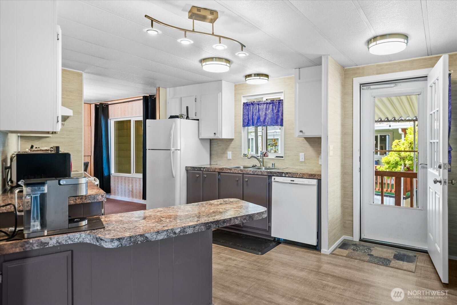 Versatile second living or hobby room.