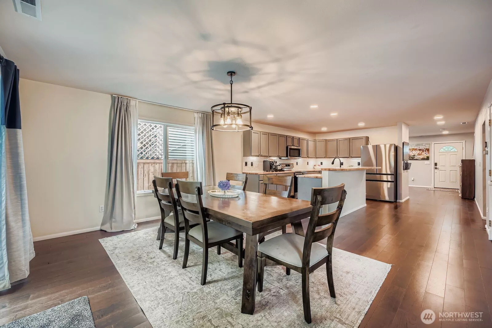 Front of home w/ two car garage and ample driveway parking