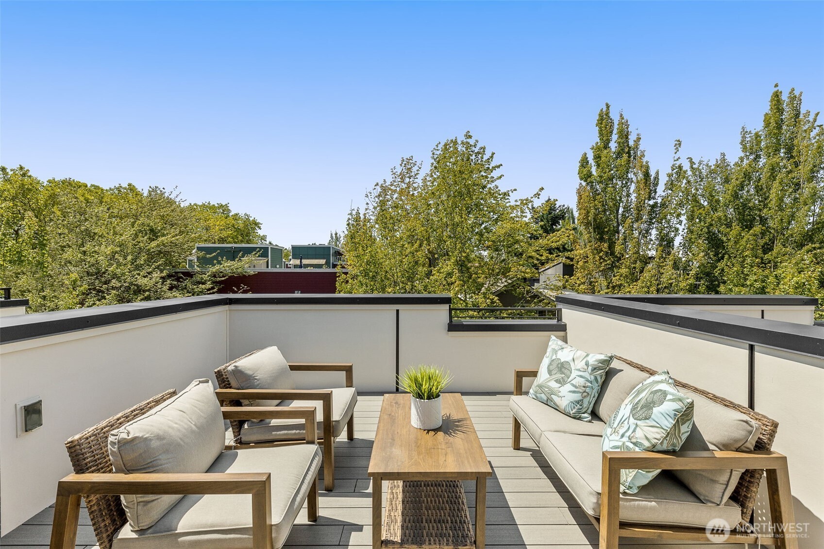 Outdoor lounge ready for entertaining, just steps from the Madrona retail corridor.