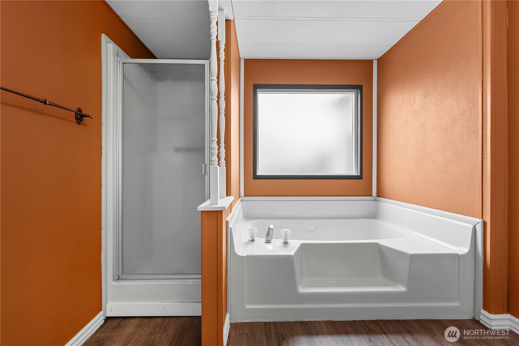 Bathroom has both a shower and a soaking tub