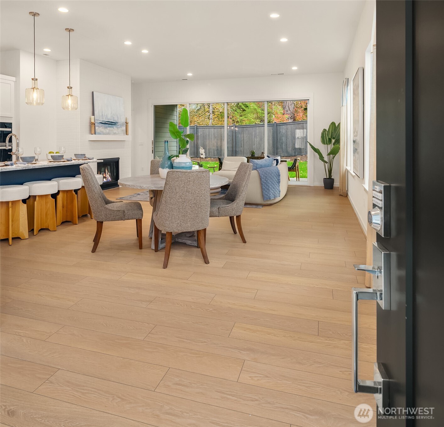 Enter to the dining and kitchen area open to great room space