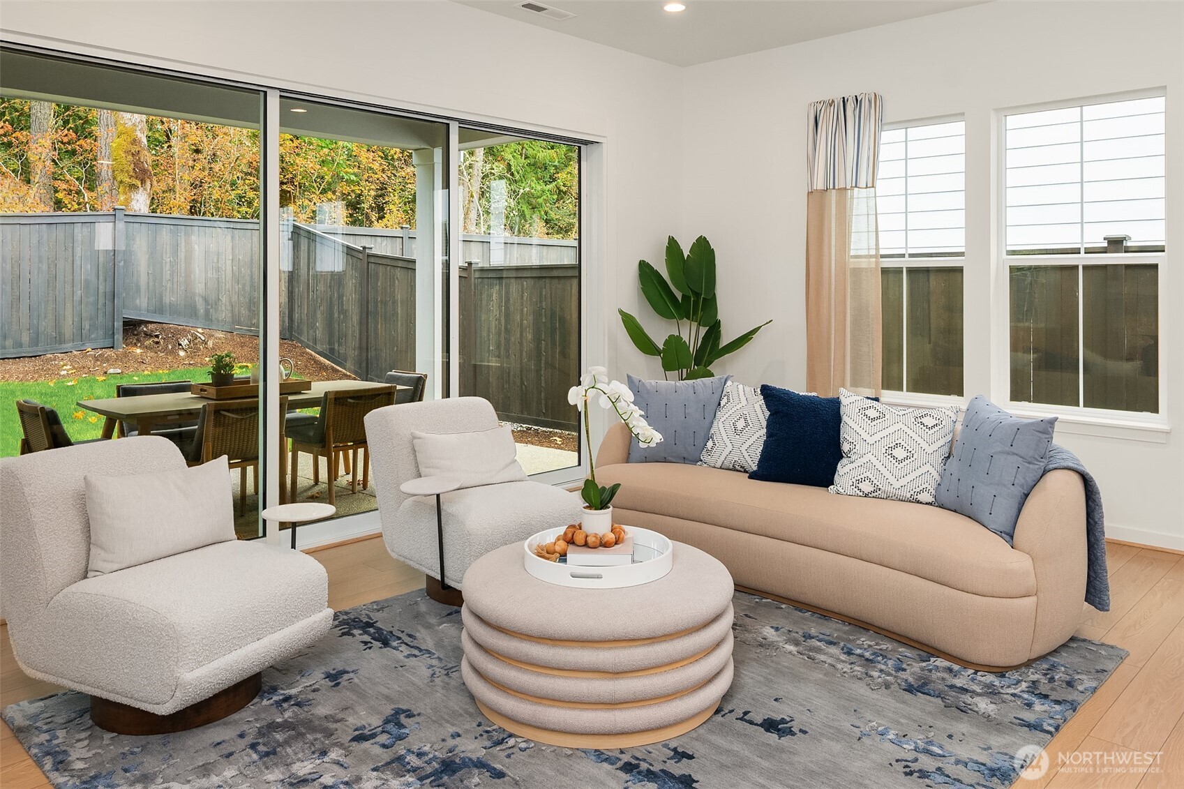 Great room with multi-stack doors to covered patio