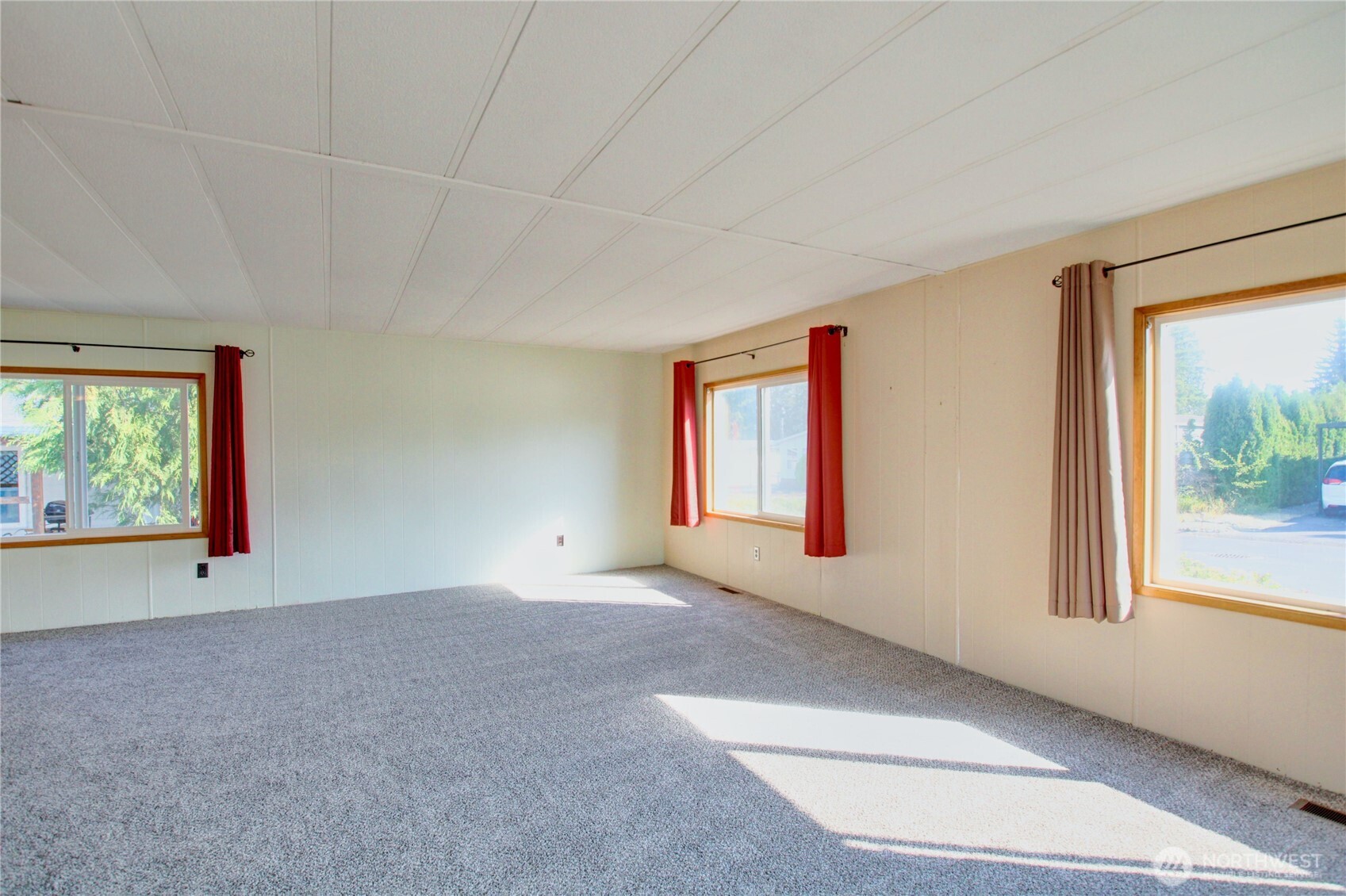 New carpet installed. Plenty of windows for natural light.