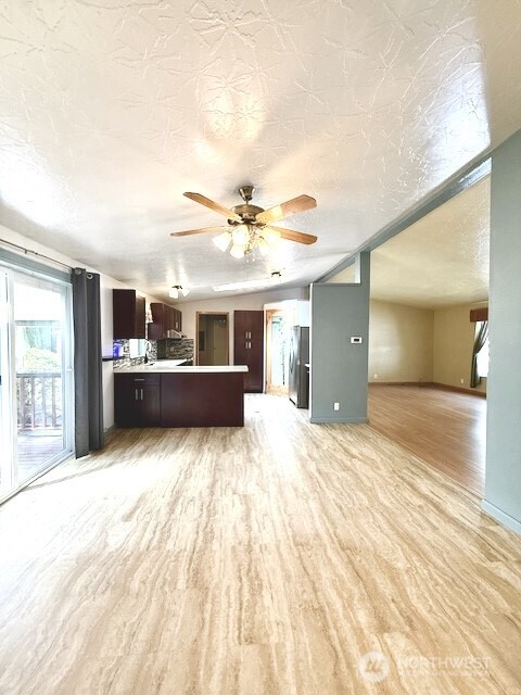 Dining room off the kitchen with slider to the patio.