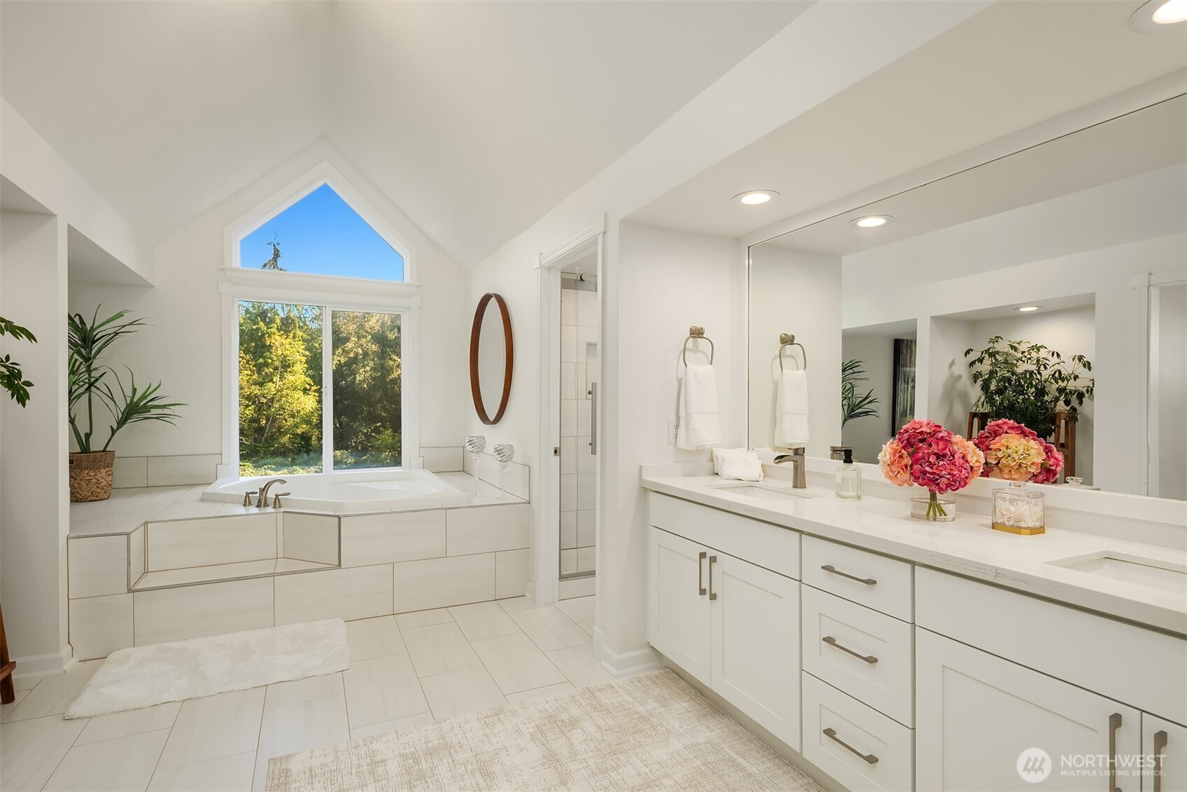 Enjoy a relaxing atmosphere in the master bedroom ensuite.