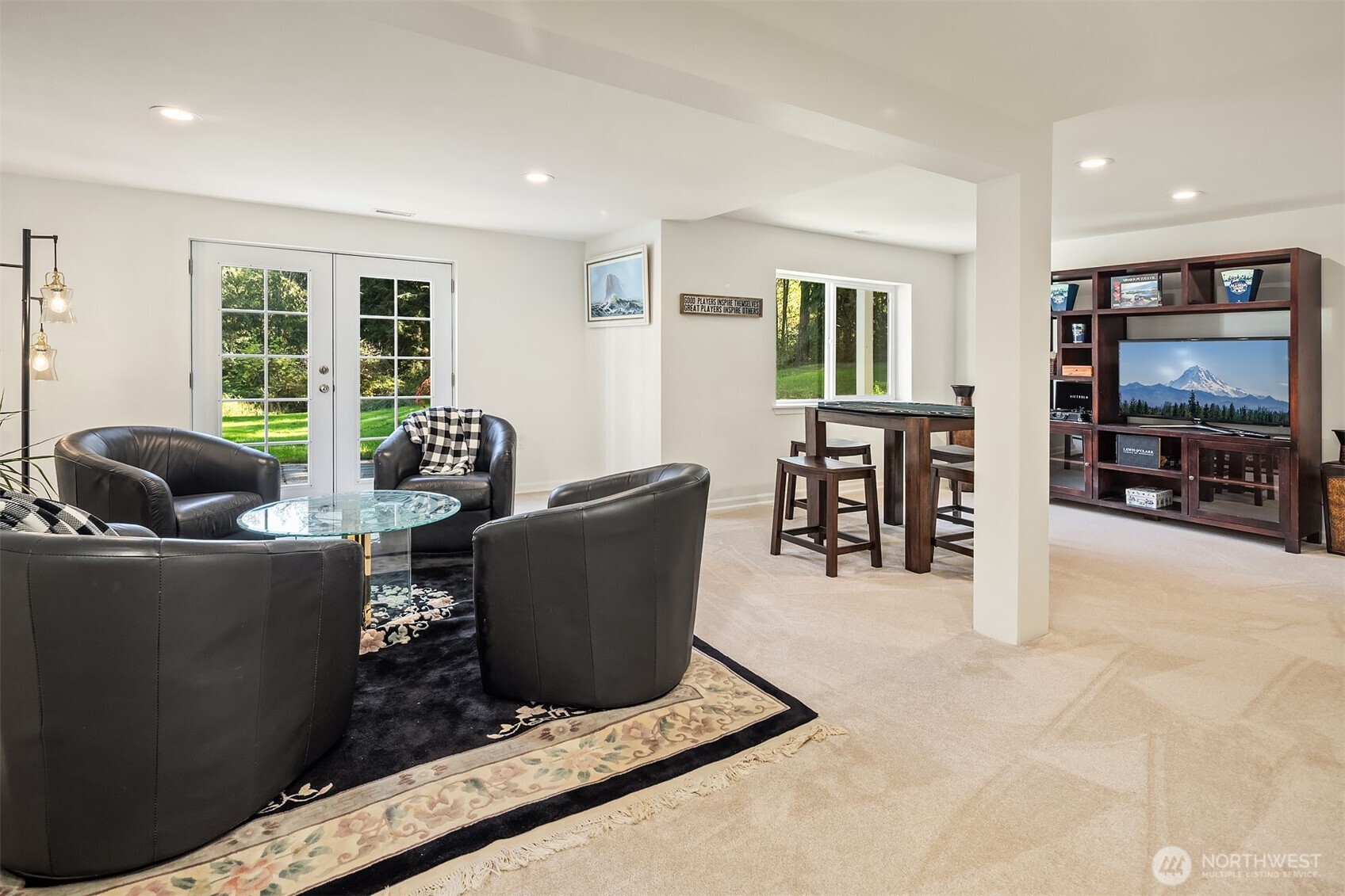 Spacious basement designed for entertaining, providing ample room for gatherings, games, and relaxation.