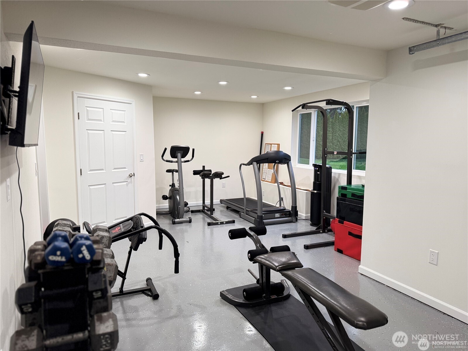 An additional single garage space offers versatility -  ideal for use as a home gym, shop or extra garage storage.