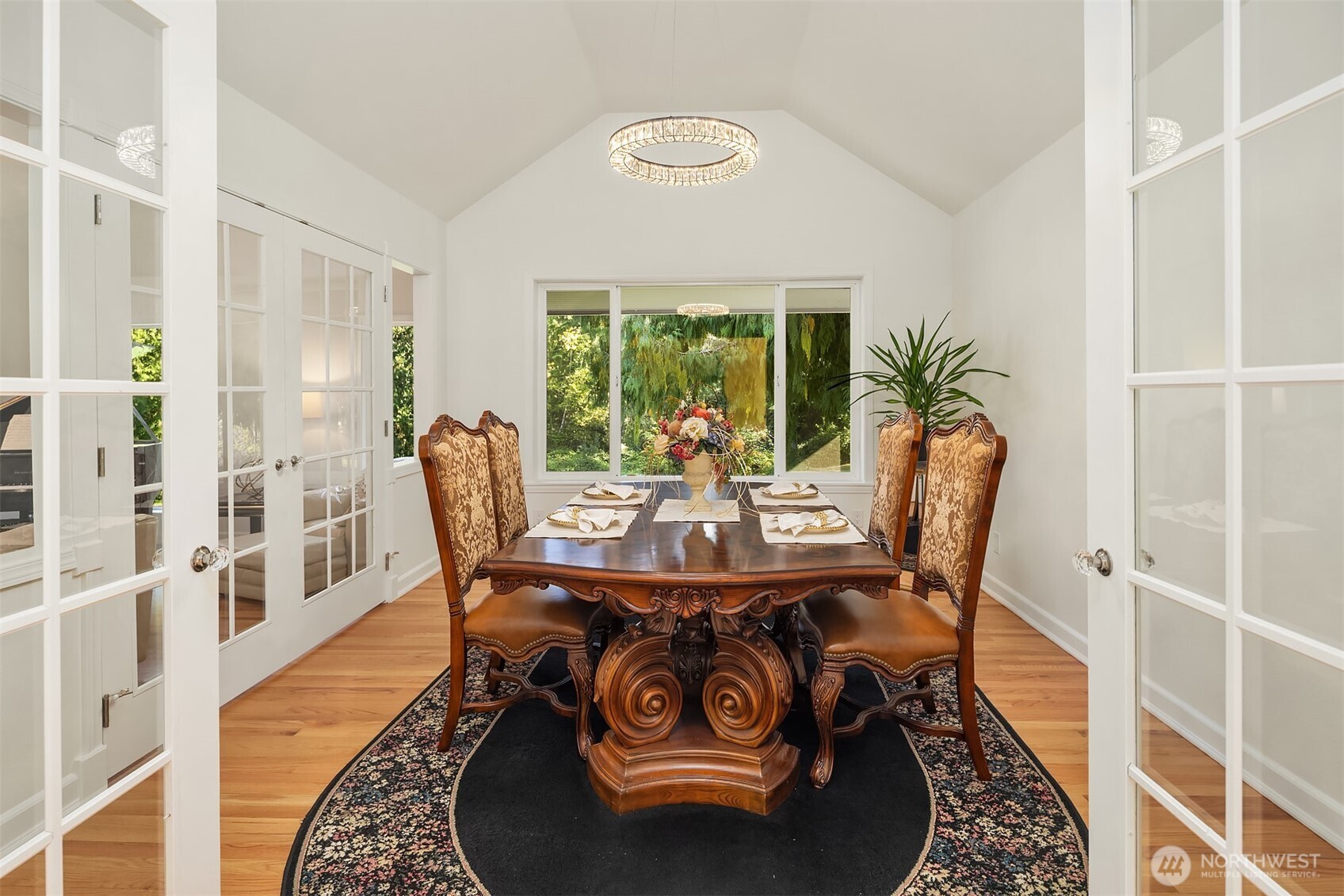Elegant formal dining room designed for memorable gatherings and plenty of natural light to complement every occasion.