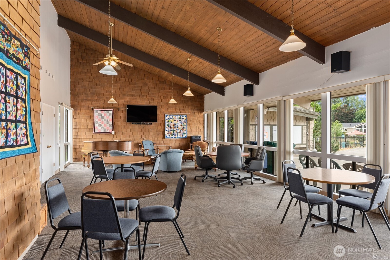 Meeting room is the main hub of the clubhouse. People meet for coffee, groups gather to watch sports games, people enjoy playing the piano, have birthday parties & much more here.