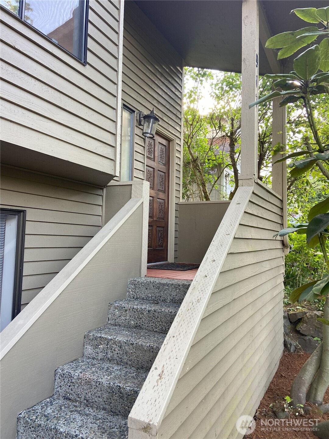 Covered area over front door when you get home.