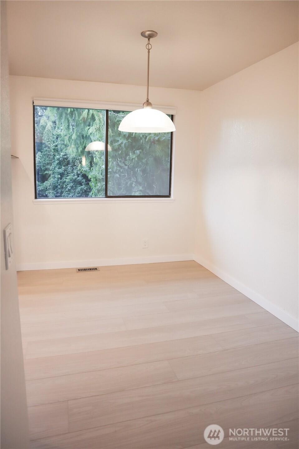 Dining room - beautiful warm tone on new LVP flooring.