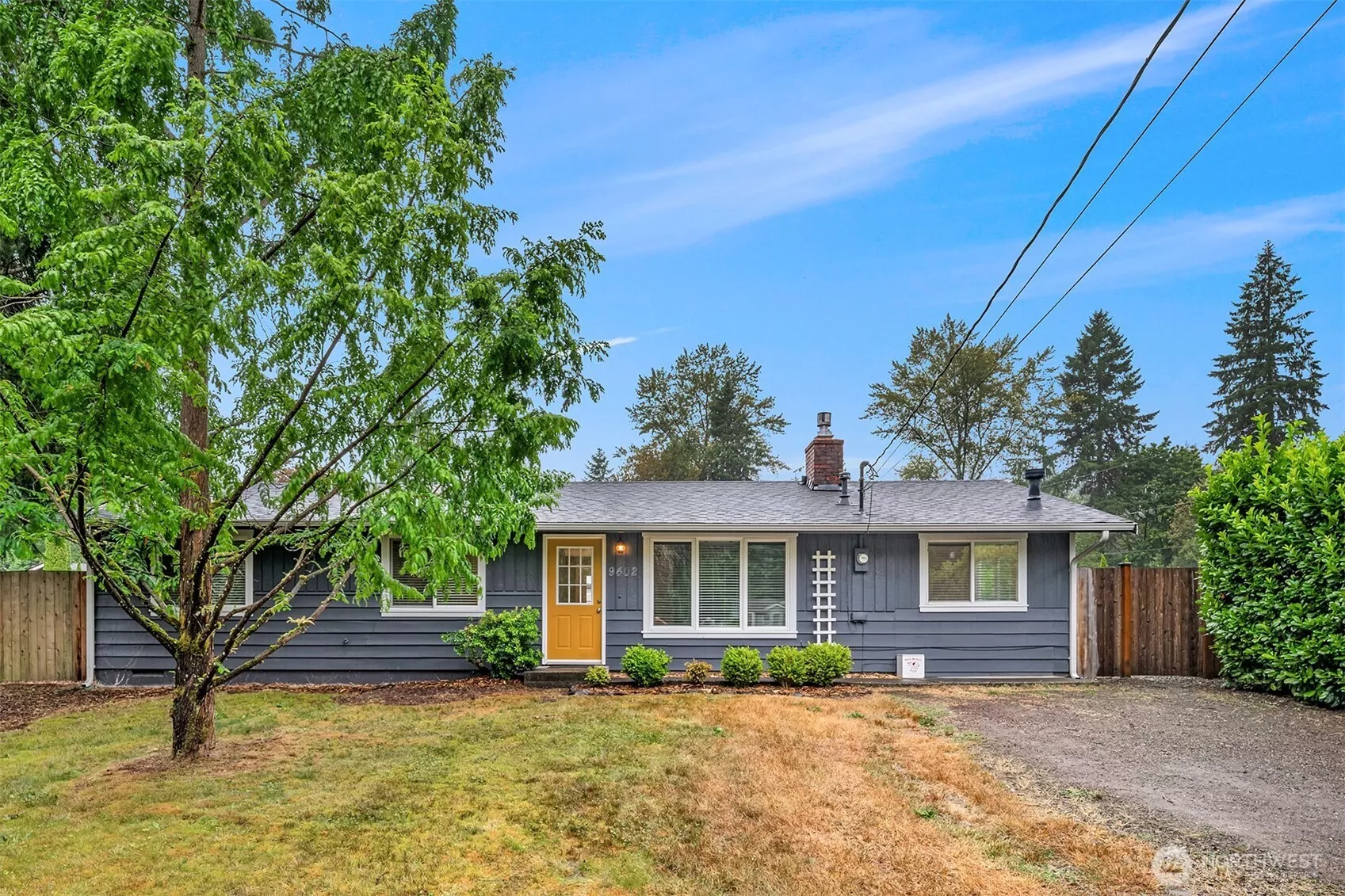 One single story rambler with large level front yard and back yard. Ample driveway parking space for multiple vehicles.