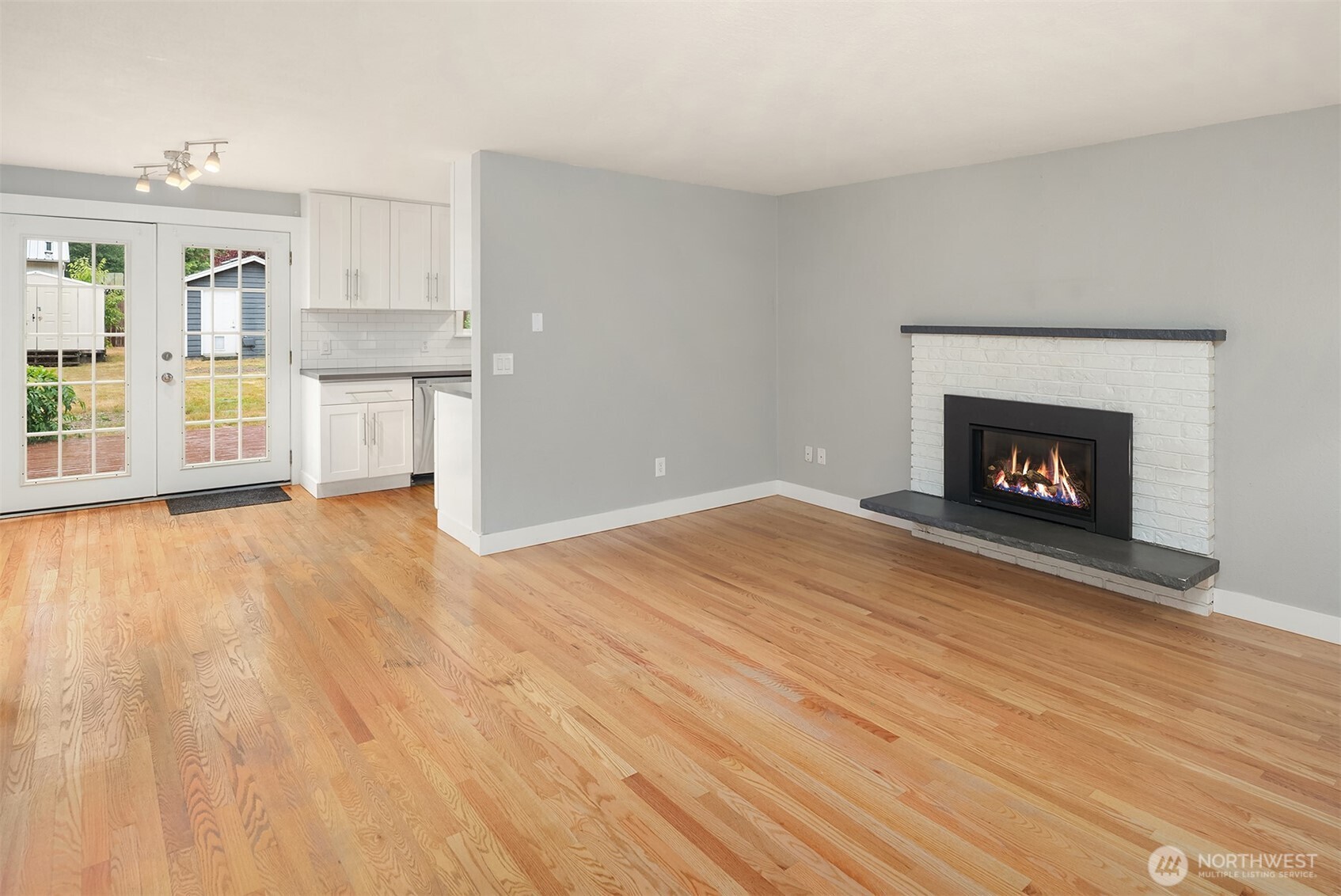 Warmth from a cozy propane fireplace fills the living room when the weather outside is crisp.