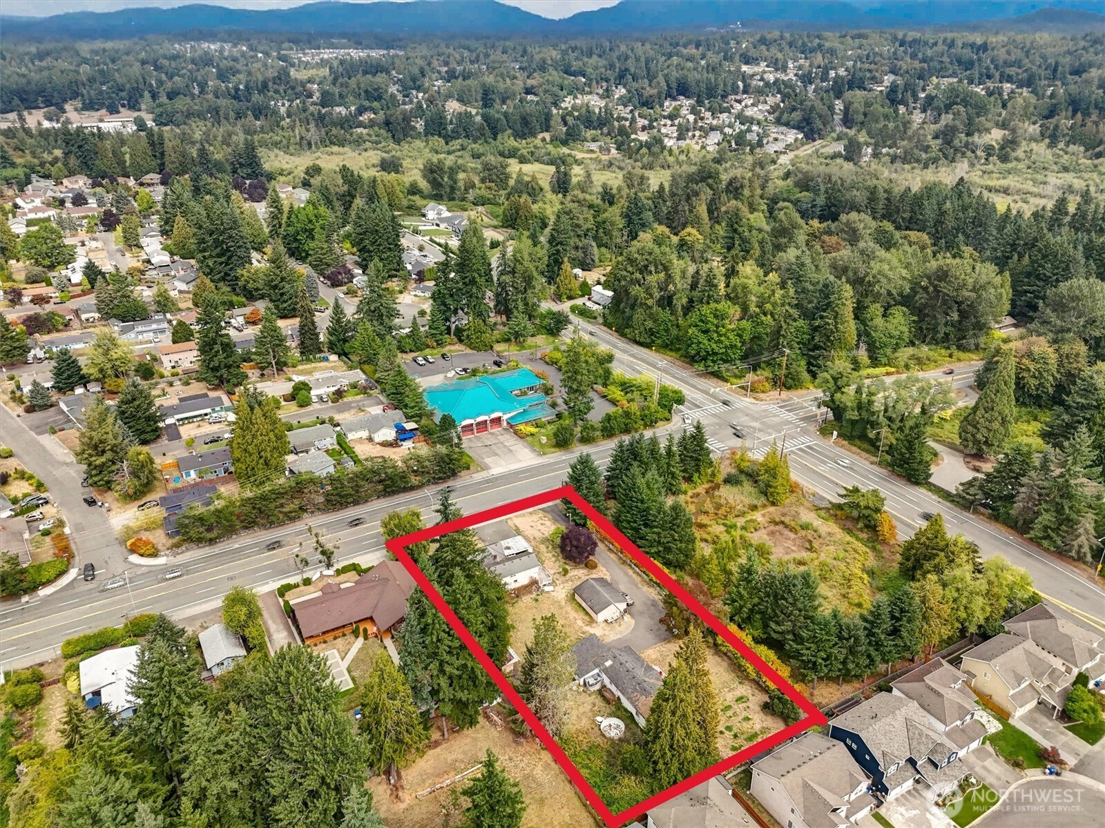 Fire department is located across the street (teal roof).