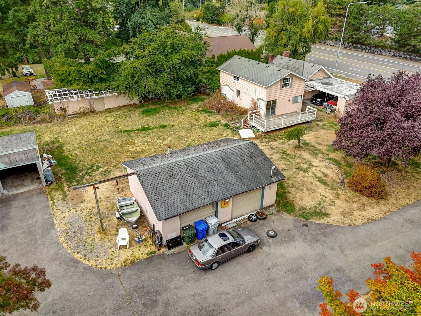 Large, detached garage on property.