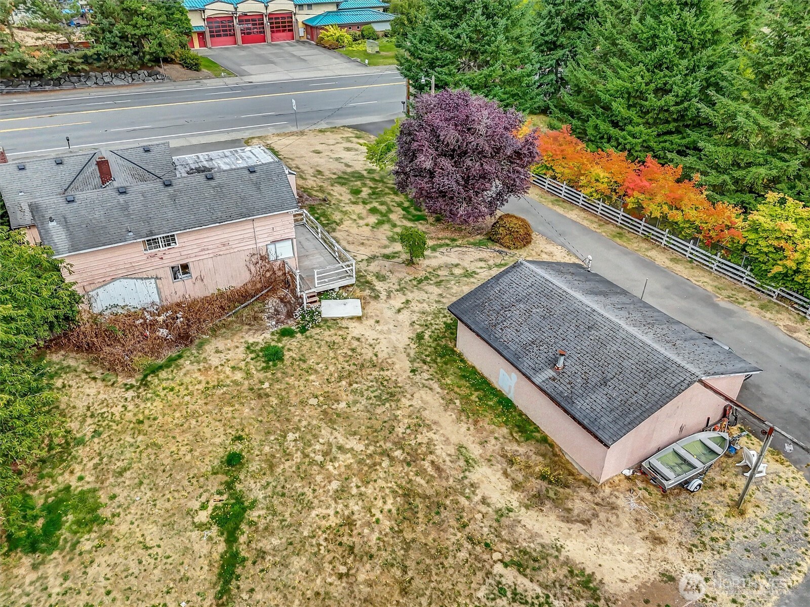 Large, detached garage on property.