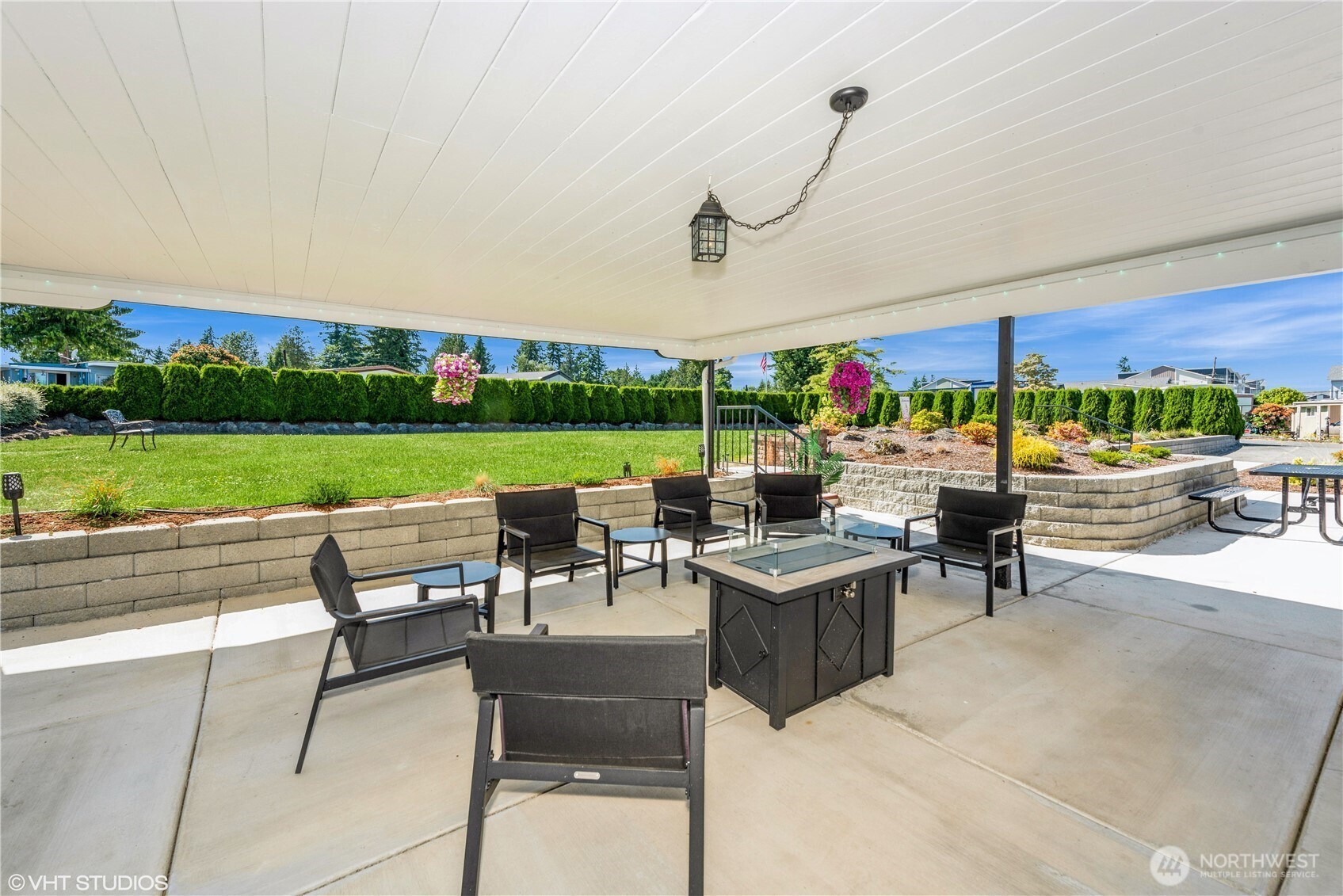 Enjoy beautifully maintained outdoor common area-ideal for fresh air, sunshine, and friendly conversations
