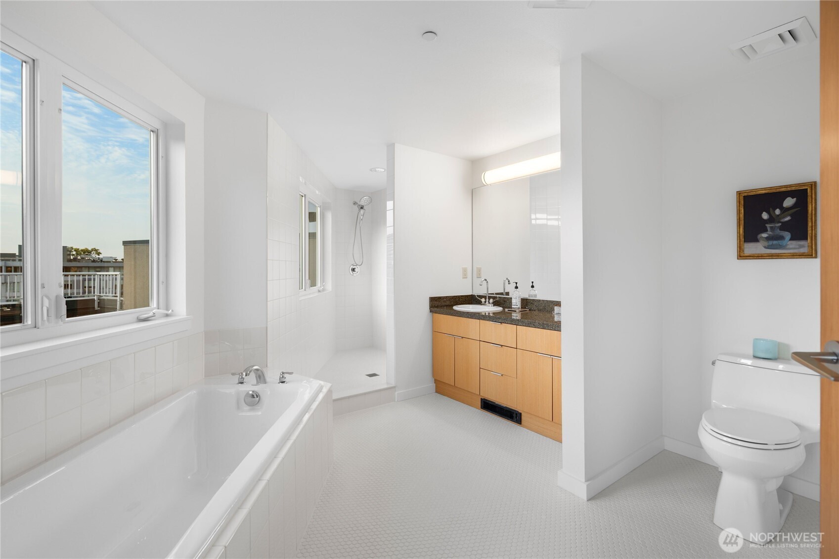 Primary ensuite bathroom was designed for luxury and function.
