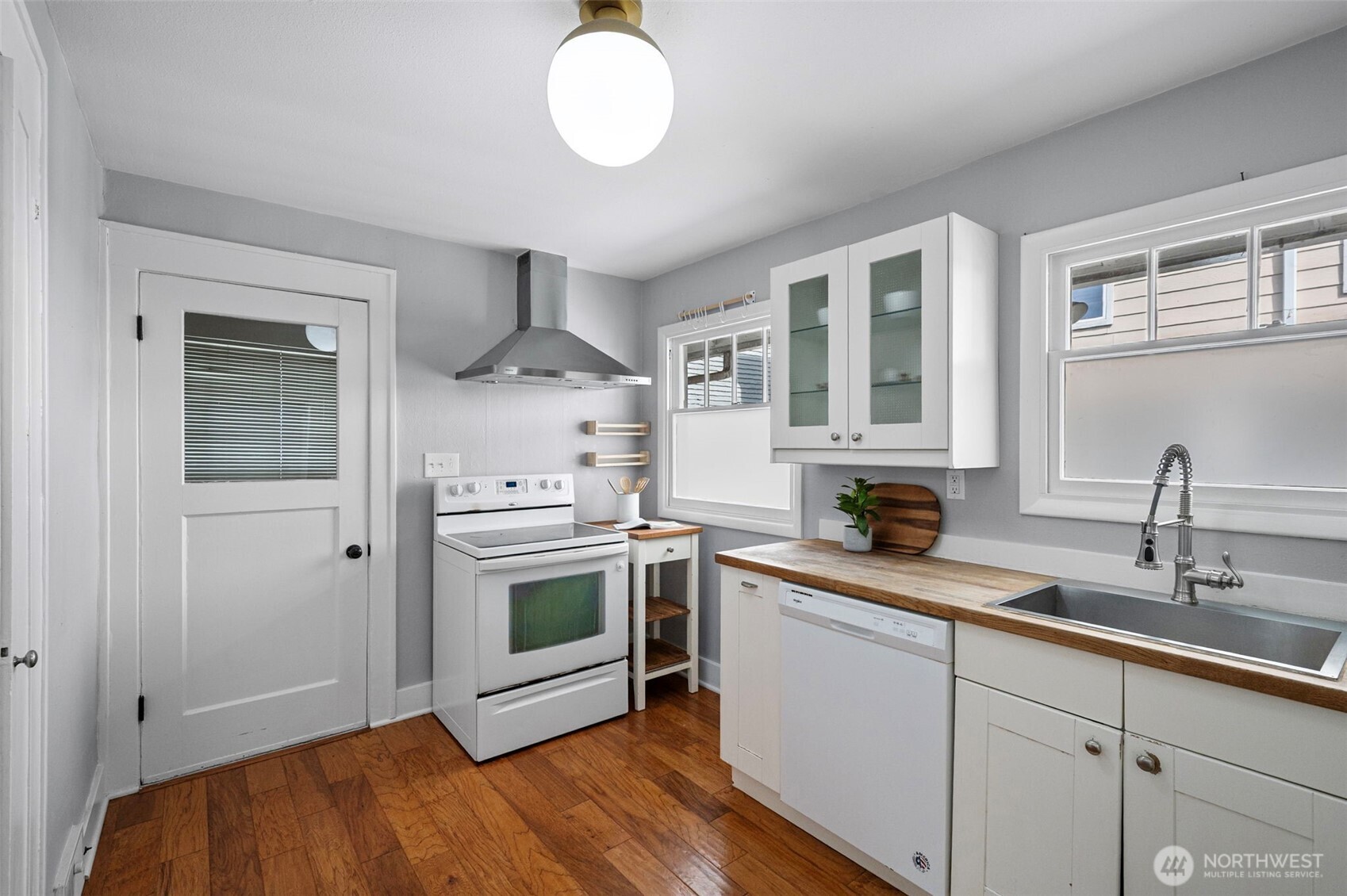 Great storage including a pantry with slide-outs.