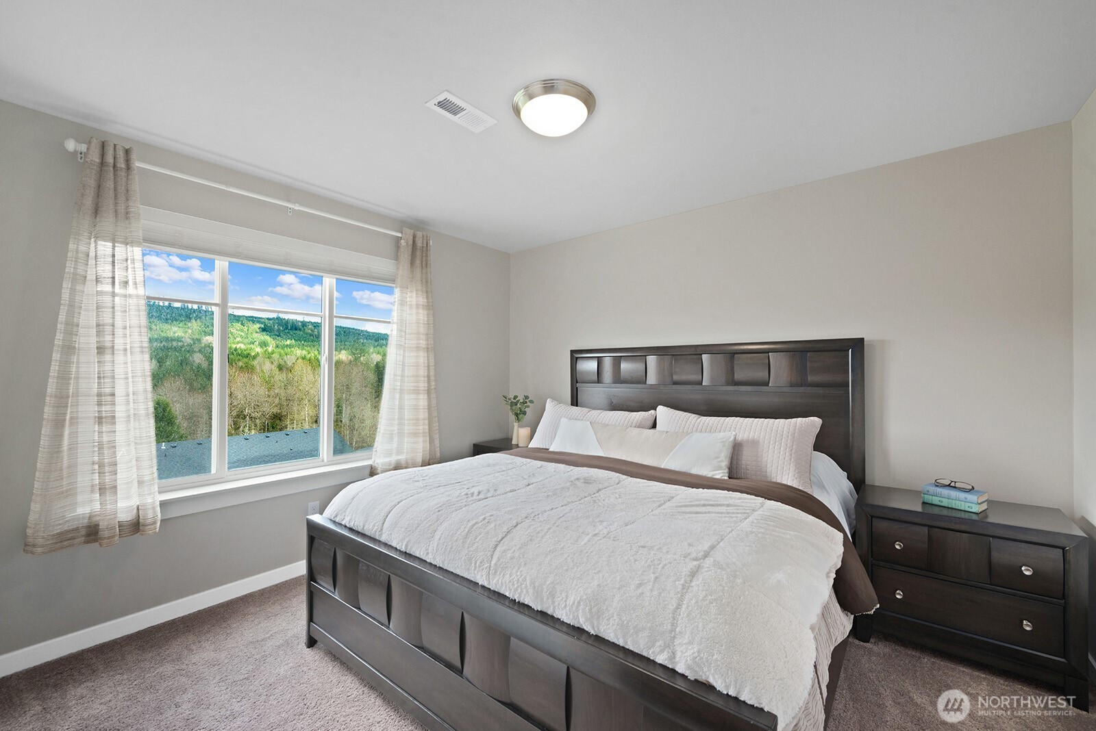 One of three guest rooms with a king size bed.
