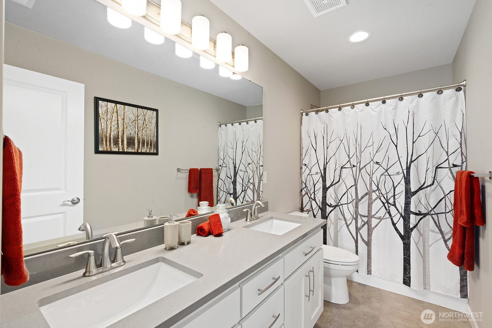 Guest bathrrom with double sinks.