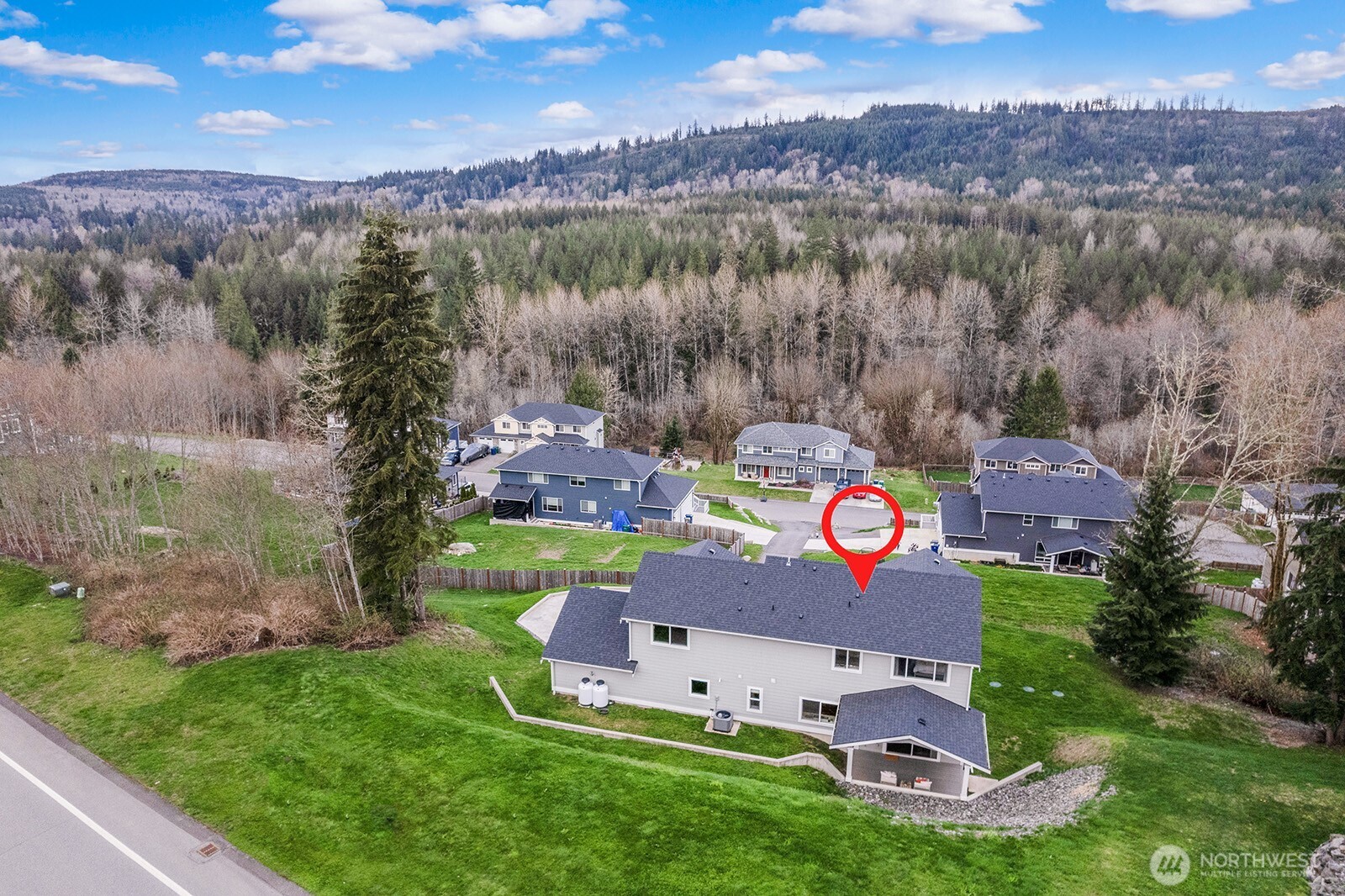 Upper lot sits above the home on the west side. Easily converted to extra parking!