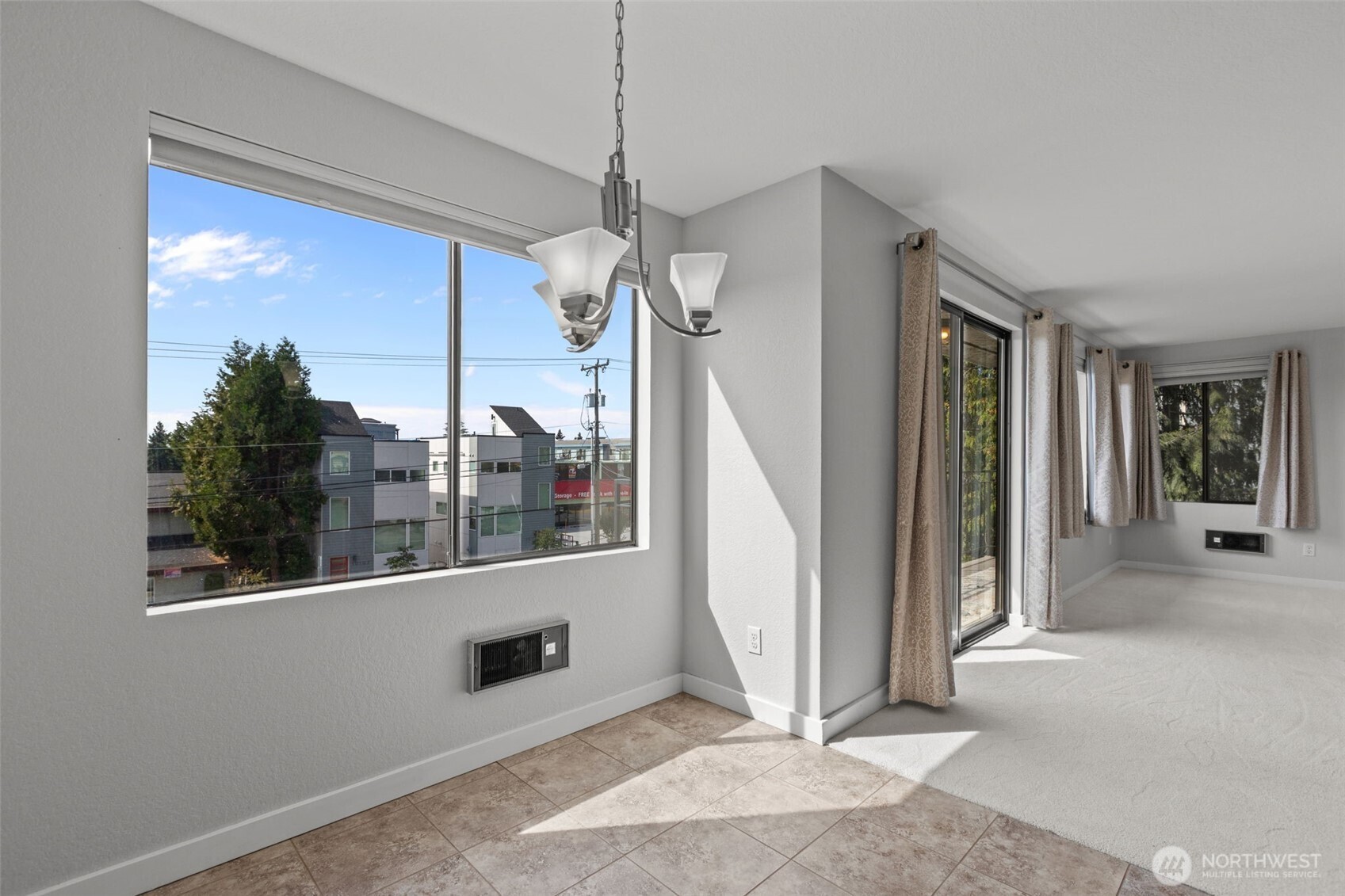 Functional kitchen design with breakfast bar and space for casual dining
