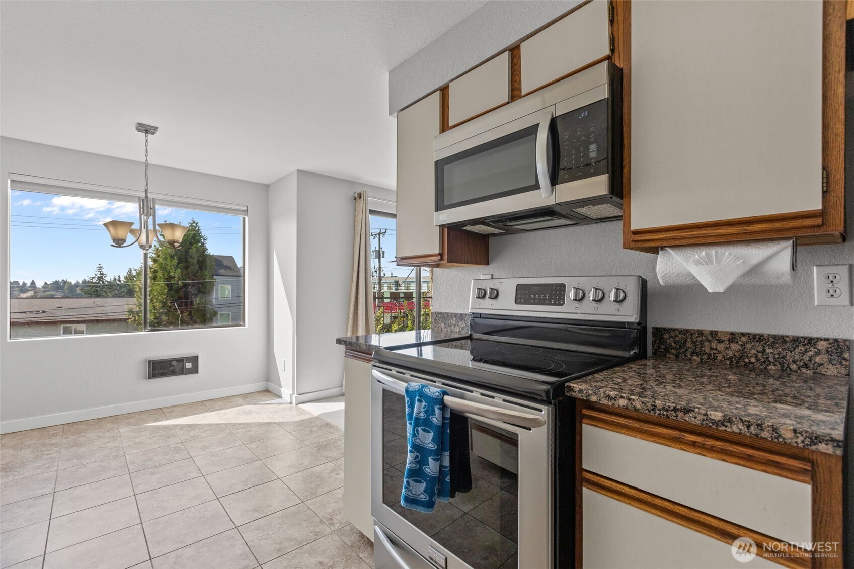 Functional kitchen design with breakfast bar and space for casual dining
