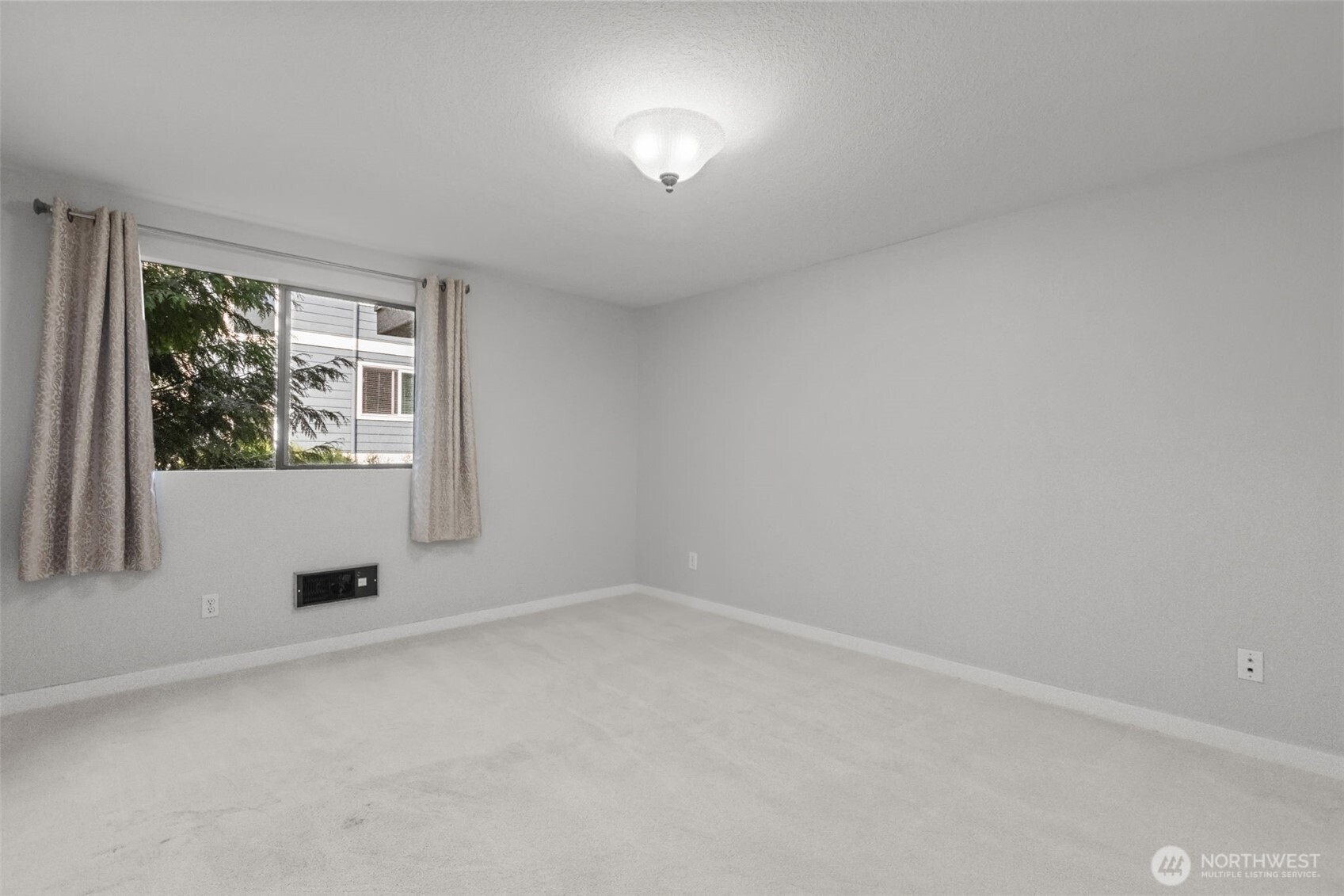 Primary bedroom with ensuite ¾ bath and abundant closet space