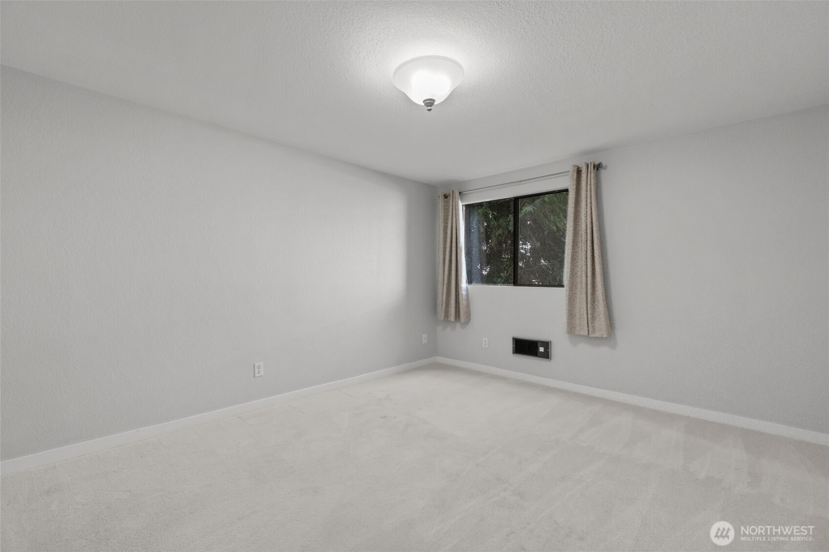 Primary bedroom with ensuite ¾ bath and abundant closet space