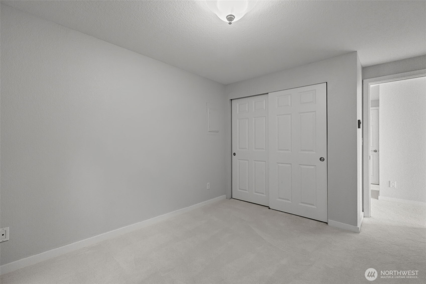 Second bedroom perfect for guests, office, or flexible use